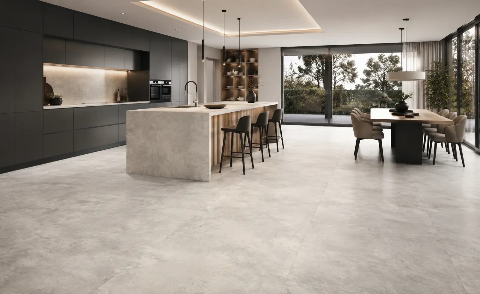 Kitchen with an island and large-format light grey stone-effect porcelain flooring